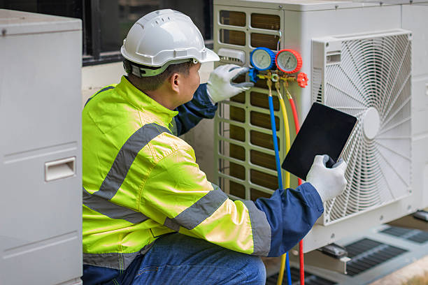 Professional Hvac technician working in Laconia, NH